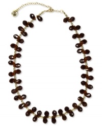 A casual-chic necklace in neutral hues from Jones New York. Clusters of brown resin beads are strung on a gold-tone linked chain. Crafted in worn gold tone mixed metal. Approximate length: 17 inches + 3-1/2-inch extender. A casual-chic necklace in neutral hues from Jones New York. Clusters of brown resin beads are strung on a gold-tone linked chain. Crafted in worn gold tone mixed metal. Approximate length: 17 inches + 3-1/2-inch extender.