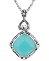 Liven your look with a chic, colorful drop. Genevieve & Grace's sparkling style combines cushion-cut blue glass (18-1/2 ct. t.w.) with glittering marcasite edges. Set in sterling silver. Approximate drop length: 18 inches. Approximate drop length: 2-1/8 inches. Approximate drop width: 1-3/8 inches. Liven your look with a chic, colorful drop. Genevieve & Grace's sparkling style combines cushion-cut blue glass (18-1/2 ct. t.w.) with glittering marcasite edges. Set in sterling silver. Approximate drop length: 18 inches. Approximate drop length: 2-1/8 inches. Approximate drop width: 1-3/8 inches.