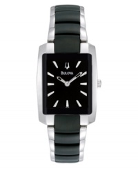 The darker side of classic. Push the envelope with this watch by Bulova. Stainless steel bracelet with black-plated center links and rectangular case with black-plated bezel. Black dial features applied silver tone stick indices, two hands and logo. Quartz movement. Water resistant to 30 meters. Three-year limited warranty. The darker side of classic. Push the envelope with this watch by Bulova. Stainless steel bracelet with black-plated center links and rectangular case with black-plated bezel. Black dial features applied silver tone stick indices, two hands and logo. Quartz movement. Water resistant to 30 meters. Three-year limited warranty.
