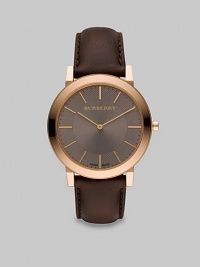 A super-slim taupe dial with sapphire crystal and rose gold detail on a smooth leather strap. Round bezel Quartz movement Date function at 6 o'clock Second hand Water resistant to 3 ATM Stainless steel case: 40mm (1.57) Leather strap: 20mm (0.79) Made in Switzerland A super-slim taupe dial with sapphire crystal and rose gold detail on a smooth leather strap. Round bezel Quartz movement Date function at 6 o'clock Second hand Water resistant to 3 ATM Stainless steel case: 40mm (1.57) Leather strap: 20mm (0.79) Made in Switzerland
