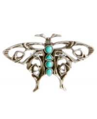 Delicate by design. Let your style take flight in Lucky Brand's intricate butterfly ring. Semi-precious reconstituted calcite turquoise stones decorate the center of a dainty open work pattern. Set in mixed metal. Size 7.
