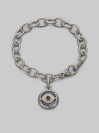 Bold, textured links of sterling silver hold a protective evil eye charm, radiantly created of white, blue and black sapphires with a touch of 18k gold. Sapphires Sterling silver and 18k yellow gold Bracelet length, about 7½ Charm diameter, about ¾ Heart-shaped lobster clasp Made in USA Bold, textured links of sterling silver hold a protective evil eye charm, radiantly created of white, blue and black sapphires with a touch of 18k gold. Sapphires Sterling silver and 18k yellow gold Bracelet length, about 7½ Charm diameter, about ¾ Heart-shaped lobster clasp Made in USA