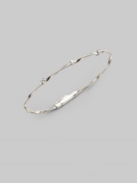 Simply stunning, this 18k gold bangle with delicate ridges and twists is studded with glimmering diamonds. Diamonds, 0.15 tcw 18k gold Diameter, about 2½ Push-lock clasp Made in Italy Please note: Bracelets sold separately. Simply stunning, this 18k gold bangle with delicate ridges and twists is studded with glimmering diamonds. Diamonds, 0.15 tcw 18k gold Diameter, about 2½ Push-lock clasp Made in Italy Please note: Bracelets sold separately.