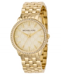 Decadent style that glistens and glitters. This Lady Nini collection watch from Michael Kors features a goldtone ion-plaged stainless steel bracelet and round case. Crystal accents at bezel. Light champagne dial with MK argyle pattern, goldtone stick indices and logo. Quartz movement. Water resistant to 50 meters. Two-year limited warranty. Decadent style that glistens and glitters. This Lady Nini collection watch from Michael Kors features a goldtone ion-plaged stainless steel bracelet and round case. Crystal accents at bezel. Light champagne dial with MK argyle pattern, goldtone stick indices and logo. Quartz movement. Water resistant to 50 meters. Two-year limited warranty.