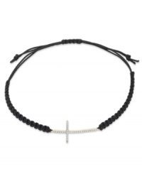 Shine of the cross. Single-cut diamonds (1/6 ct. t.w.) are set in YellOra™ and centered on a black parachute cord for a stunning effect. Bracelet adjusts to fit wrist. Approximate length: 11 inches. Shine of the cross. Single-cut diamonds (1/6 ct. t.w.) are set in YellOra™ and centered on a black parachute cord for a stunning effect. Bracelet adjusts to fit wrist. Approximate length: 11 inches.