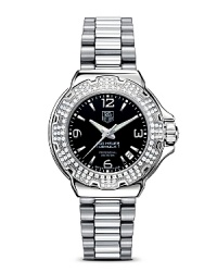 Fernando Alonso, the Formula 1 double World Champion, has participated with TAG Heuer in this design that reflects his relaxed, sporting image. With black dial and 120 diamond studded bezel. Features a date window. Fernando Alonso, the Formula 1 double World Champion, has participated with TAG Heuer in this design that reflects his relaxed, sporting image. With black dial and 120 diamond studded bezel. Features a date window.