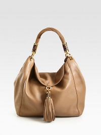 A roomy carryall in luxurious pebbled leather accented in radiant hardware.Shoulder strap, 10 dropMagnetic snap strap closureOne outside zip pocketOne inside zip pocketTwo inside open pocketsSatin lining11½W X 12½H X 3½DImported A roomy carryall in luxurious pebbled leather accented in radiant hardware.Shoulder strap, 10 dropMagnetic snap strap closureOne outside zip pocketOne inside zip pocketTwo inside open pocketsSatin lining11½W X 12½H X 3½DImported