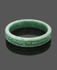 For a look as unique as you. This carefully-crafted and carved bangle features an intricate scrolling pattern made entirely of beautiful green jade. Bangle slips over the wrist. Approximate diameter: 3 inches. For a look as unique as you. This carefully-crafted and carved bangle features an intricate scrolling pattern made entirely of beautiful green jade. Bangle slips over the wrist. Approximate diameter: 3 inches.