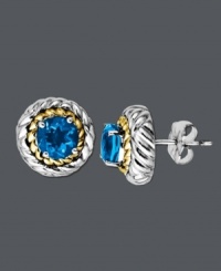Stud earrings provide the perfect versatile accessory. These dazzling earrings feature a sterling silver setting with 14k gold rope edging that highlights a round-cut blue topaz (2 ct. t.w.). Approximate diameter: 3/8 inch. Stud earrings provide the perfect versatile accessory. These dazzling earrings feature a sterling silver setting with 14k gold rope edging that highlights a round-cut blue topaz (2 ct. t.w.). Approximate diameter: 3/8 inch.