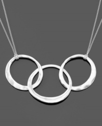 Harmonious style for every woman. This lovely Kenneth Cole New York circle pendant is crafted in white silvertone mixed metal. Approximate length: 16 inches + 3-inch extender. Approximate drop: 2-1/2 inches. Approximate pendant width: 3-1/2 inches.