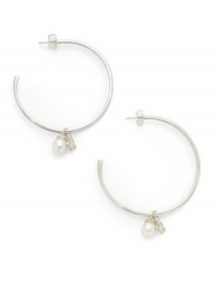 THE LOOKCharms collectionLarge hoop silhouetteBee and white oval pearl accent charmsSterling silver settingPost backTHE MEASUREMENTDiameter, about 2.25ORIGINMade in USA THE LOOKCharms collectionLarge hoop silhouetteBee and white oval pearl accent charmsSterling silver settingPost backTHE MEASUREMENTDiameter, about 2.25ORIGINMade in USA