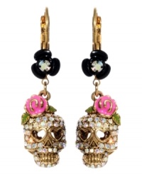 Cuteness to die for, Betsey Johnson does it again. Crystal skulls with heart-shaped eyes and pink flower accents hang from black enamel flowers. Earrings crafted from antique gold-plated mixed metal. Approximate drop: 1-1/2 inches. Cuteness to die for, Betsey Johnson does it again. Crystal skulls with heart-shaped eyes and pink flower accents hang from black enamel flowers. Earrings crafted from antique gold-plated mixed metal. Approximate drop: 1-1/2 inches.