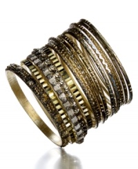 Stackably chic. Style&co.'s set of 16 bangles creates a luminous glow with textured and smooth bangles in gold and aluminum tone mixed metal. Approximate diameter: 2-3/4 inches. Stackably chic. Style&co.'s set of 16 bangles creates a luminous glow with textured and smooth bangles in gold and aluminum tone mixed metal. Approximate diameter: 2-3/4 inches.