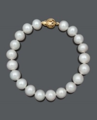 The perfect last-minute touch for a sophisticated look. This elegant bracelet features AA+ cultured freshwater pearls (9-10 mm) with an ornate 14k gold clasp. Approximate length: 8 inches. The perfect last-minute touch for a sophisticated look. This elegant bracelet features AA+ cultured freshwater pearls (9-10 mm) with an ornate 14k gold clasp. Approximate length: 8 inches.