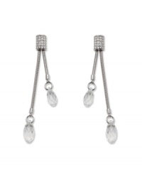 Complement your evening wear with pristine drops by Swarovski. Double faceted crystal drops are suspended from crystal-coated rectangular posts. Crafted in silver tone mixed metal. Approximate drop: 2-5/16 inches.