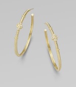 From the Jolie Collection. Elegantly fluted gold hoops, accented with gold beading and quatrefoil shapes set with sparkling diamonds.Diamonds, .12 tcw14k yellow goldDiameter, about 1½Post backImported
