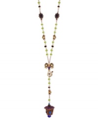 This elegant Y-shaped necklace from Betsey Johnson flaunts a rose-gold tone lantern charm with purple glitter, blue accents, multi-colored beads, purple mouse charm with crystal accents and small gold tone disc accents. Crafted in antiqued gold tone mixed metal. Approximate length: 26 inches + 3-inch extender. Approximate drop: 6 inches. This elegant Y-shaped necklace from Betsey Johnson flaunts a rose-gold tone lantern charm with purple glitter, blue accents, multi-colored beads, purple mouse charm with crystal accents and small gold tone disc accents. Crafted in antiqued gold tone mixed metal. Approximate length: 26 inches + 3-inch extender. Approximate drop: 6 inches.