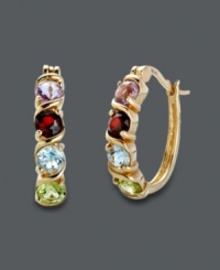 Playful color amps up the traditional hoop earring. Victoria Townsend earrings highlight round-cut garnet (5/8 ct. t.w.), amethyst (5/8 ct. t.w.), peridot (1/2 ct. t.w.), and blue topaz (5/8 ct. t.w.). Crafted in 18k gold over sterling silver. Approximate diameter: 7/8 inch. Playful color amps up the traditional hoop earring. Victoria Townsend earrings highlight round-cut garnet (5/8 ct. t.w.), amethyst (5/8 ct. t.w.), peridot (1/2 ct. t.w.), and blue topaz (5/8 ct. t.w.). Crafted in 18k gold over sterling silver. Approximate diameter: 7/8 inch.