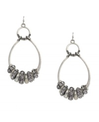 Hip hoop hooray! Featuring a unique oval double-drop silhouette, Jessica Simpson's earrings will stand out as a trendy addition to your wardrobe. Embellished with glittering glass accents, they're set in silver tone mixed metal. Approximate drop: 3 inches. Hip hoop hooray! Featuring a unique oval double-drop silhouette, Jessica Simpson's earrings will stand out as a trendy addition to your wardrobe. Embellished with glittering glass accents, they're set in silver tone mixed metal. Approximate drop: 3 inches.