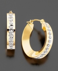 Sweet diamond accents give these 14k gold earrings soft, modern beauty. Approximate diameter: 1/2 inches. Sweet diamond accents give these 14k gold earrings soft, modern beauty. Approximate diameter: 1/2 inches.