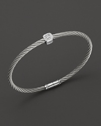 From the Classique Collection, a stackable bangle in white gold and stainless steel with diamond stations. Designed by Charriol. From the Classique Collection, a stackable bangle in white gold and stainless steel with diamond stations. Designed by Charriol.