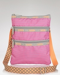 LeSportsac's latest crossbody features a vibrant print and plenty of pockets, sure to add a on-trend pop when you're darting around town. LeSportsac's latest crossbody features a vibrant print and plenty of pockets, sure to add a on-trend pop when you're darting around town.