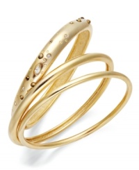 Amp up your glam factor. Alfani's three bangle set combines polished gold skinny bangles with a thicker bangle accented by a spray of sparkling clear and taupe-colored glass. Set in gold tone mixed metal. Approximate diameter: 2-1/2 inches. Amp up your glam factor. Alfani's three bangle set combines polished gold skinny bangles with a thicker bangle accented by a spray of sparkling clear and taupe-colored glass. Set in gold tone mixed metal. Approximate diameter: 2-1/2 inches.