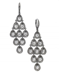Elegance comes full circle in this pair of chandelier earrings from Eliot Danori. Crafted from hematite-tone brass, the earrings make stunning use of black glass crystal and cubic zirconia (1 ct. t.w.) accents. Approximate drop: 2 inches. Elegance comes full circle in this pair of chandelier earrings from Eliot Danori. Crafted from hematite-tone brass, the earrings make stunning use of black glass crystal and cubic zirconia (1 ct. t.w.) accents. Approximate drop: 2 inches.
