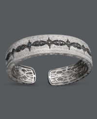 Style and sophistication combine. This elegant bangle bracelet features an intricate design decorated with round-cut white diamonds (3/8 ct. t.w.) and round-cut blue diamonds (1/3 ct. t.w.) set in sterling silver. Approximate diameter: 2-1/2 inches. Style and sophistication combine. This elegant bangle bracelet features an intricate design decorated with round-cut white diamonds (3/8 ct. t.w.) and round-cut blue diamonds (1/3 ct. t.w.) set in sterling silver. Approximate diameter: 2-1/2 inches.