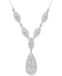 Shimmering style! Sparkling crystals and cubic zirconias (3/8 ct. t.w.) join together on this Y necklace from Eliot Danori. Set in silver tone mixed metal, it's a dazzling decorative detail for any special occasion. Approximate length: 16 inches + 2-inch extender. Approximate drop: 2 inches. Shimmering style! Sparkling crystals and cubic zirconias (3/8 ct. t.w.) join together on this Y necklace from Eliot Danori. Set in silver tone mixed metal, it's a dazzling decorative detail for any special occasion. Approximate length: 16 inches + 2-inch extender. Approximate drop: 2 inches.