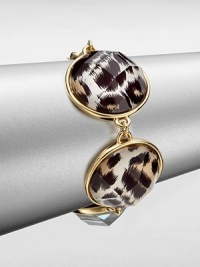 Let your true animal out with this leopard printed style. Epoxy14k goldplated brassLength, about 8.5Hinged closureImported 
