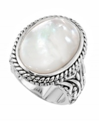 Capture free-spirited style with this chic cocktail ring. Crafted by City by City, ring features an oval-shaped mother of pearl center stone surrounded by an intricate rope edging and detailed band. Crafted in silver tone mixed metal. Size 7 and 8. Capture free-spirited style with this chic cocktail ring. Crafted by City by City, ring features an oval-shaped mother of pearl center stone surrounded by an intricate rope edging and detailed band. Crafted in silver tone mixed metal. Size 7 and 8.