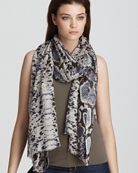 Look fierce in this multicolored snake print scarf from Bindya. Look fierce in this multicolored snake print scarf from Bindya.