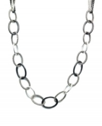 Long story: Alfani updates a classic chain link necklace with this long, fashionable frontal style. Crafted in antique silver tone and hematite tone mixed metal. Approximate length: 32 inches. Long story: Alfani updates a classic chain link necklace with this long, fashionable frontal style. Crafted in antique silver tone and hematite tone mixed metal. Approximate length: 32 inches.