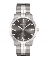 A classically designed timepiece built with precision, by Tissot. PR 100 collection watch crafted of stainless steel bracelet and round titanium case. Black dial features luminous hour markers, minute track, numerals at six, nine and twelve o'clock, three hands, date window at three o'clock and logo at twelve o'clock. Swiss quartz movement. Water resistant to 100 meters. Two-year limited warranty. A classically designed timepiece built with precision, by Tissot. PR 100 collection watch crafted of stainless steel bracelet and round titanium case. Black dial features luminous hour markers, minute track, numerals at six, nine and twelve o'clock, three hands, date window at three o'clock and logo at twelve o'clock. Swiss quartz movement. Water resistant to 100 meters. Two-year limited warranty.