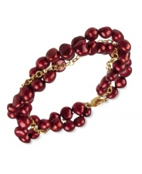 Go for a subtle hint of color. This beautiful bracelet features cranberry-colored cultured freshwater pearls (6-7 mm) set in 18k gold over sterling silver. Approximate length: 7-1/2 inches. Go for a subtle hint of color. This beautiful bracelet features cranberry-colored cultured freshwater pearls (6-7 mm) set in 18k gold over sterling silver. Approximate length: 7-1/2 inches.