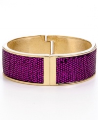 Your inner girly girl will be drawn to the glam qualities of Betsey Johnson's glitter bangle. Crafted in gold-plated mixed metal, bangle features a secure hinge closure and fuchsia glitter overlay. Approximate diameter: 2-1/2 inches. Approximate length: 8 inches. Your inner girly girl will be drawn to the glam qualities of Betsey Johnson's glitter bangle. Crafted in gold-plated mixed metal, bangle features a secure hinge closure and fuchsia glitter overlay. Approximate diameter: 2-1/2 inches. Approximate length: 8 inches.