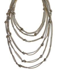Change your tone with doubled-up fashion. This BCBGeneration necklace features several rows of woven chains accented by knotted detail. Crafted in silver tone and gold tone mixed metal. Approximate length: 19 inches. Change your tone with doubled-up fashion. This BCBGeneration necklace features several rows of woven chains accented by knotted detail. Crafted in silver tone and gold tone mixed metal. Approximate length: 19 inches.