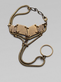 Inspired by the sculptor's whimsical mobiles, this brass design combines vintage snake chains, antiqued link chains and diamond-shape panels, with a tail that slips over one finger.BrassLength adjusts from about 6¼-7¼Lobster claspMade in USA Inspired by the sculptor's whimsical mobiles, this brass design combines vintage snake chains, antiqued link chains and diamond-shape panels, with a tail that slips over one finger.BrassLength adjusts from about 6¼-7¼Lobster claspMade in USA