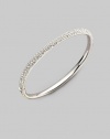 EXCLUSIVELY AT SAKS. Three rows of crystal impart their endless sparkle to a slender bangle, to wear alone or stack with others. Crystal Rhodium plated Diameter, about 2½ Hinged with push-lock clasp Imported Please note: Bracelets sold separately.