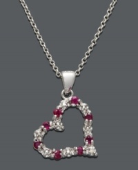 The perfect way to express your love. This open-cut heart pendant by Victoria Townsend features bright red rubies (1/3 ct. t.w.) and sparkling diamond accents set in sterling silver. Approximate length: 18 inches. Approximate drop: 7/8 inch. The perfect way to express your love. This open-cut heart pendant by Victoria Townsend features bright red rubies (1/3 ct. t.w.) and sparkling diamond accents set in sterling silver. Approximate length: 18 inches. Approximate drop: 7/8 inch.