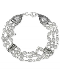 Truly elegant. Genevieve & Grace's three-row bracelet brings freshwater pearls (4-4-1/2 mm), sterling silver and marcasite together for a stunning look. Approximate length: 7-1/2 inches. Truly elegant. Genevieve & Grace's three-row bracelet brings freshwater pearls (4-4-1/2 mm), sterling silver and marcasite together for a stunning look. Approximate length: 7-1/2 inches.