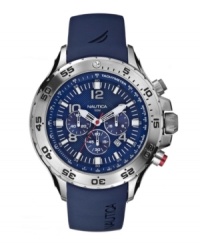 Blissful blue with chronograph functionality. This Nautica watch features a blue resin strap and round stainless steel case. Bezel etched with numerals. Blue dial with logo, stick indices and numerals, three subdials and date window. Quartz movement. Water resistant to 100 meters. Five-year limited warranty. Blissful blue with chronograph functionality. This Nautica watch features a blue resin strap and round stainless steel case. Bezel etched with numerals. Blue dial with logo, stick indices and numerals, three subdials and date window. Quartz movement. Water resistant to 100 meters. Five-year limited warranty.