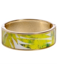 Channel the exoticism and energy of Brasil in Haskell's inspired skinny bangle. The Palm bangle features a yellow and green palm leaf print design, set in gold tone mixed metal with a hinge clasp. Approximate diameter: 2-1/2 inches. Approximate length: 8 inches. Item comes packaged in a green gift box. Channel the exoticism and energy of Brasil in Haskell's inspired skinny bangle. The Palm bangle features a yellow and green palm leaf print design, set in gold tone mixed metal with a hinge clasp. Approximate diameter: 2-1/2 inches. Approximate length: 8 inches. Item comes packaged in a green gift box.