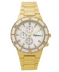 Glamour suits you. Turn up the shine with this watch by Style&co. Gold tone mixed metal bracelet and round case with white bezel. Mother-of-pearl dial features gold tone stick indices, three crystal accents, minute track, three multifunctional subdials, three hands and logo. Quartz movement. Splash resistant. Two-year limited warranty. Glamour suits you. Turn up the shine with this watch by Style&co. Gold tone mixed metal bracelet and round case with white bezel. Mother-of-pearl dial features gold tone stick indices, three crystal accents, minute track, three multifunctional subdials, three hands and logo. Quartz movement. Splash resistant. Two-year limited warranty.