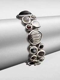 From the Mosaic Collection. A beautiful mix of black onyx, garnet, hematite, moon quartz and grey moonstone set in sleek sterling silver. Black onyx, garnet, hematite, moon quartz and grey moonstoneSterling silverDiamonds, .22 tcwLength, about 7½Push clasp closureImported From the Mosaic Collection. A beautiful mix of black onyx, garnet, hematite, moon quartz and grey moonstone set in sleek sterling silver. Black onyx, garnet, hematite, moon quartz and grey moonstoneSterling silverDiamonds, .22 tcwLength, about 7½Push clasp closureImported