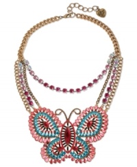 Emerge from your drab cocoon with a little help from Betsey Johnson! This charming frontal necklace features a butterfly pendant with pink, blue and black-colored crystal accents and a pink-colored crystal cup chain. Crafted in antiqued gold tone mixed metal. Approximate length: 16 inches + 3-inch extender. Approximate drop length: 3-3/4 inches. Approximate drop width: 4-1/10 inches. Emerge from your drab cocoon with a little help from Betsey Johnson! This charming frontal necklace features a butterfly pendant with pink, blue and black-colored crystal accents and a pink-colored crystal cup chain. Crafted in antiqued gold tone mixed metal. Approximate length: 16 inches + 3-inch extender. Approximate drop length: 3-3/4 inches. Approximate drop width: 4-1/10 inches.