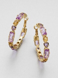 Add a touch of color with this pretty multicolored, faceted design in a classic hoop design. Glass and plastic stones12k goldplated brassLength, about 1Hinged post backImported Add a touch of color with this pretty multicolored, faceted design in a classic hoop design. Glass and plastic stones12k goldplated brassLength, about 1Hinged post backImported