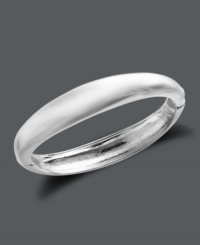 Add a Touch of Silver with this polished style. This smooth hinge bangle slips on easily and shimmers in silver-plated zinc alloy. Approximate diameter: 2-1/3 inches. Approximate bangle width: 2/5 inch to 1/2 inch.