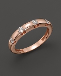 Diamonds dot a 14K rose gold band. Diamonds dot a 14K rose gold band.